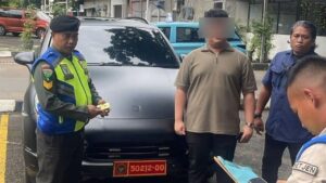 Porsche Berpelat Dinas Kemhan Tak Terdaftar, Pengemudi Diserahkan ke Polisi