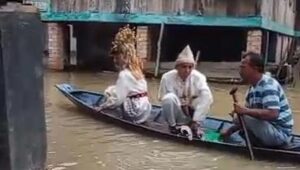 Resepsi Pernikahan di PALI Tetap Meriah Meski Digelar di Tengah Banjir Luapan Sungai Lematang